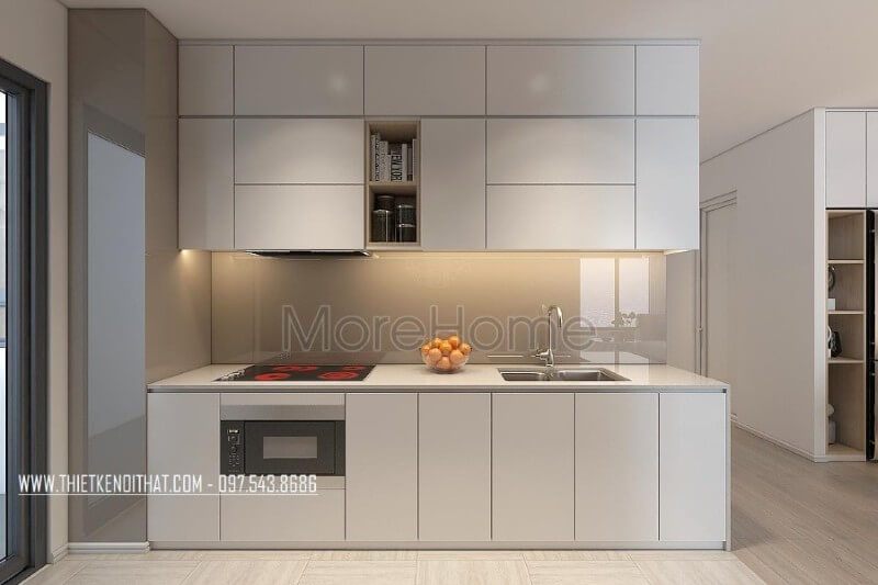 . Mẫu tủ bếp có kiểu dáng chữ i gỗ acrylic màu trắng và được phân chia các ngăn tủ hợp lí, giúp cho người nội trợ dễ dàng hơn trong việc chuẩn bị những bữa ăn ngon miệng cho những người thân yêu.